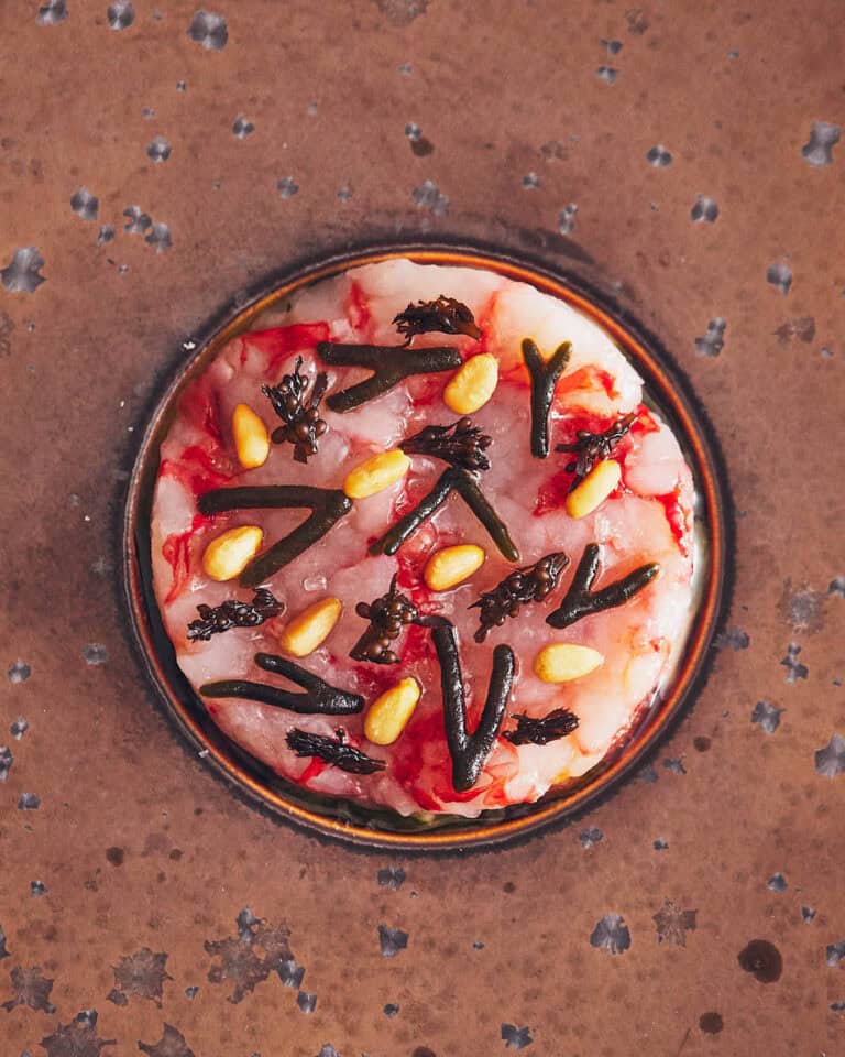 Carabinerogarnaal met citrus, pijnboompitten en kombu-olie